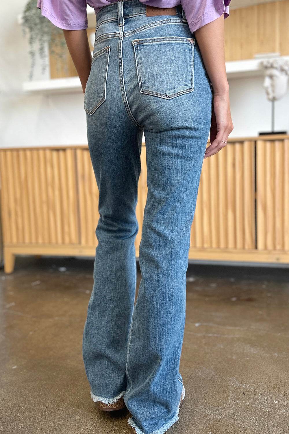 Judy Blue Full Size Distressed Raw Hem Bootcut Jeans - DaTrendStore.Com