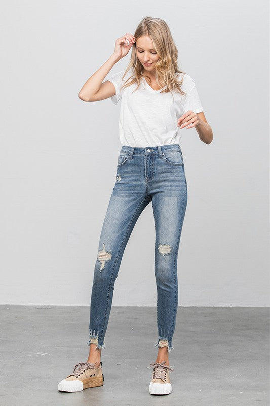 HIGH STRETCH MID RISE SKINNY JEANS