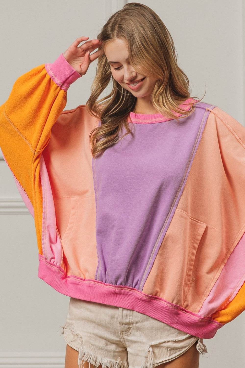 BiBi Color Block Exposed Seam Sweatshirt with Pockets - DaTrendStore.Com