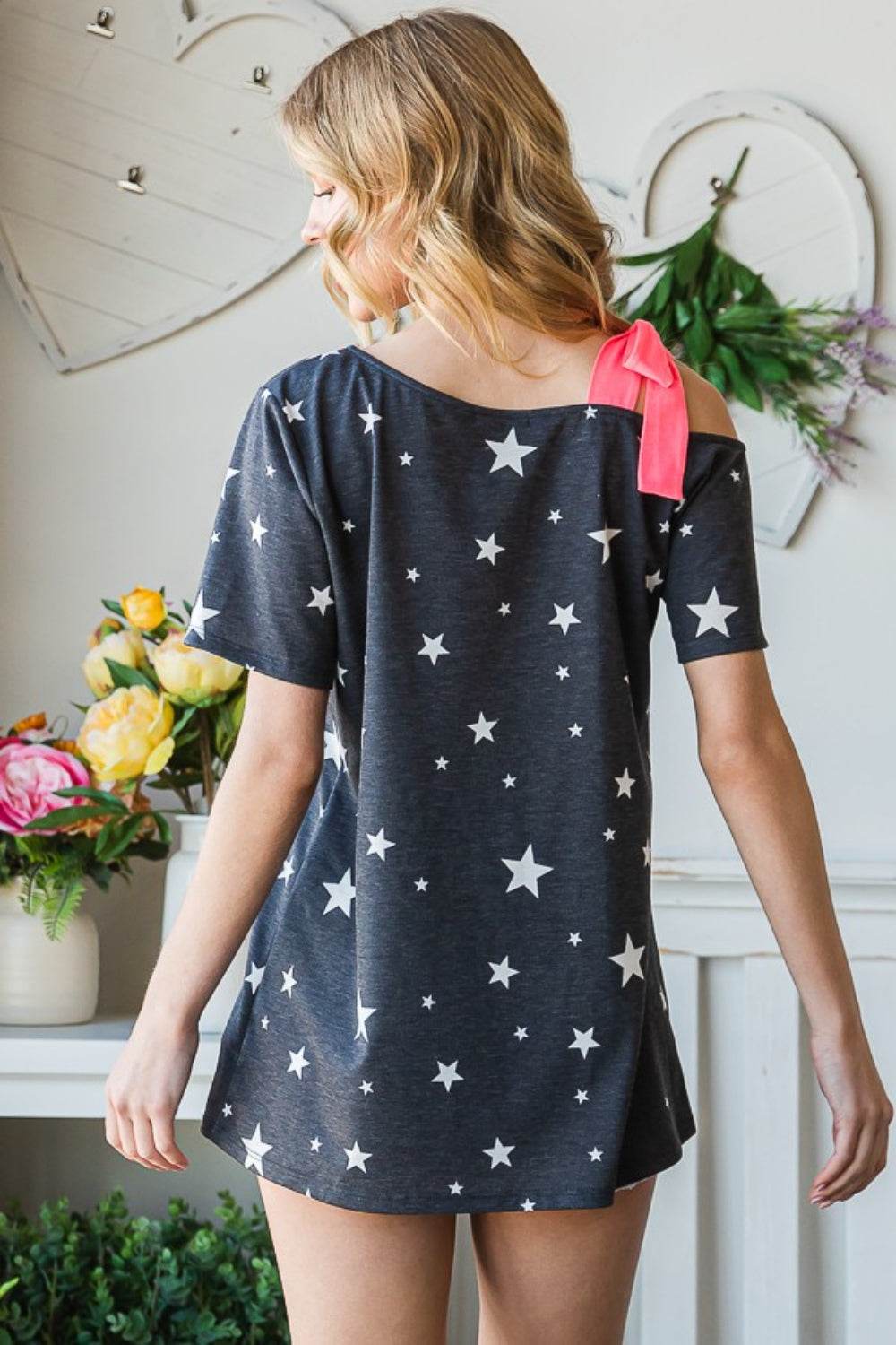 Heimish Full Size Star Print Asymmetrical Neck Short Sleeve Top - DaTrendStore.Com