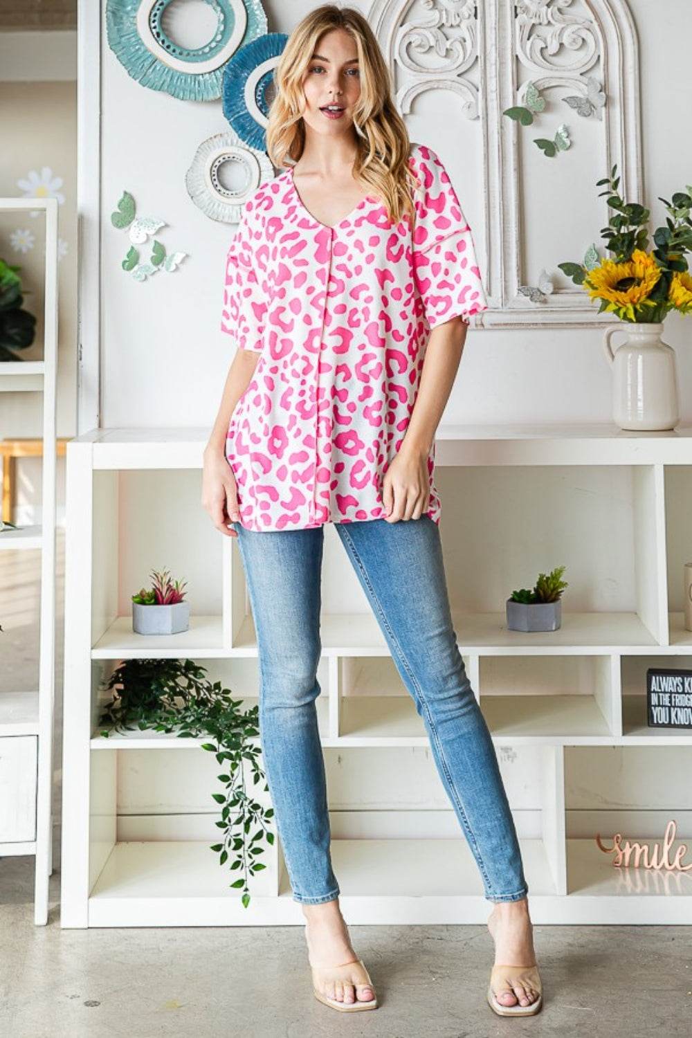 Heimish Full Size Leopard Exposed Seam Short Sleeve Top - DaTrendStore.Com