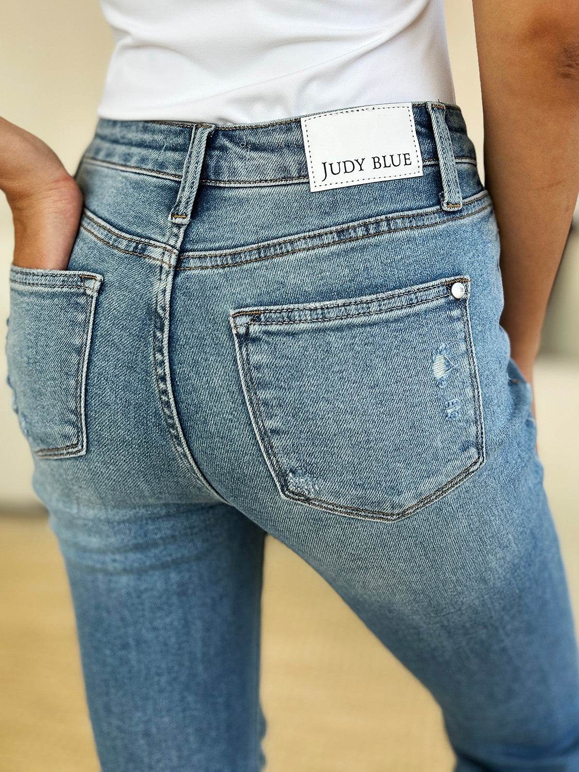Judy Blue Full Size Mid Rise Destroyed Hem Distressed Jeans - DaTrendStore.Com
