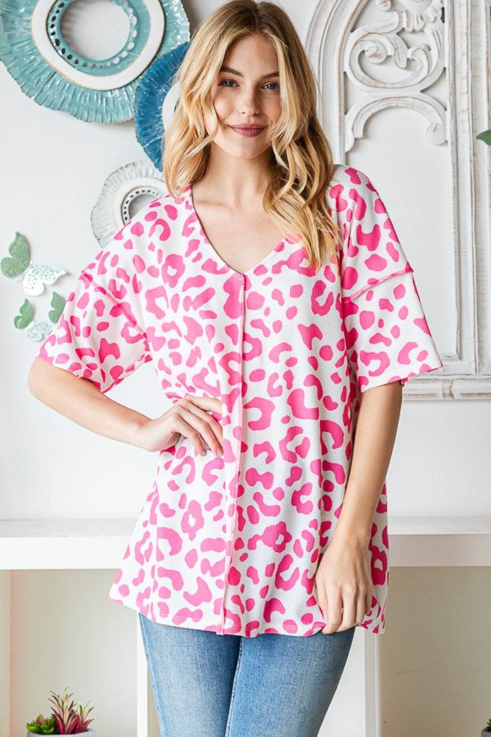 Heimish Full Size Leopard Exposed Seam Short Sleeve Top - DaTrendStore.Com