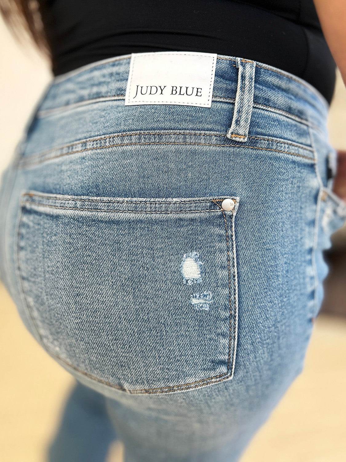 Judy Blue Full Size Mid Rise Destroyed Hem Distressed Jeans - DaTrendStore.Com