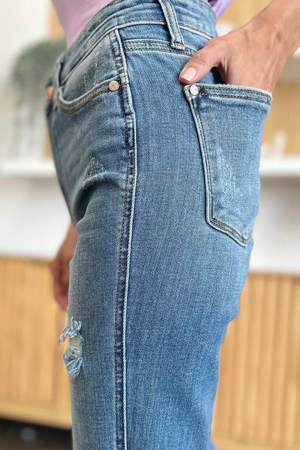 Judy Blue Full Size Distressed Raw Hem Bootcut Jeans - DaTrendStore.Com