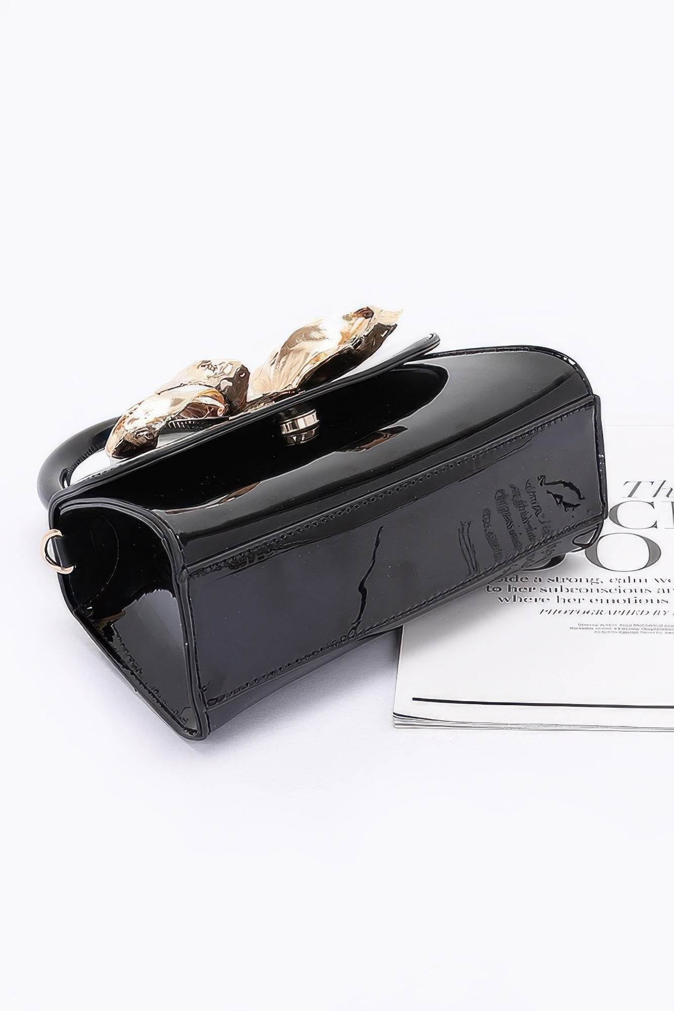 Faux Leather Metal Ribbon Top Handle Bag - DaTrendStore.Com