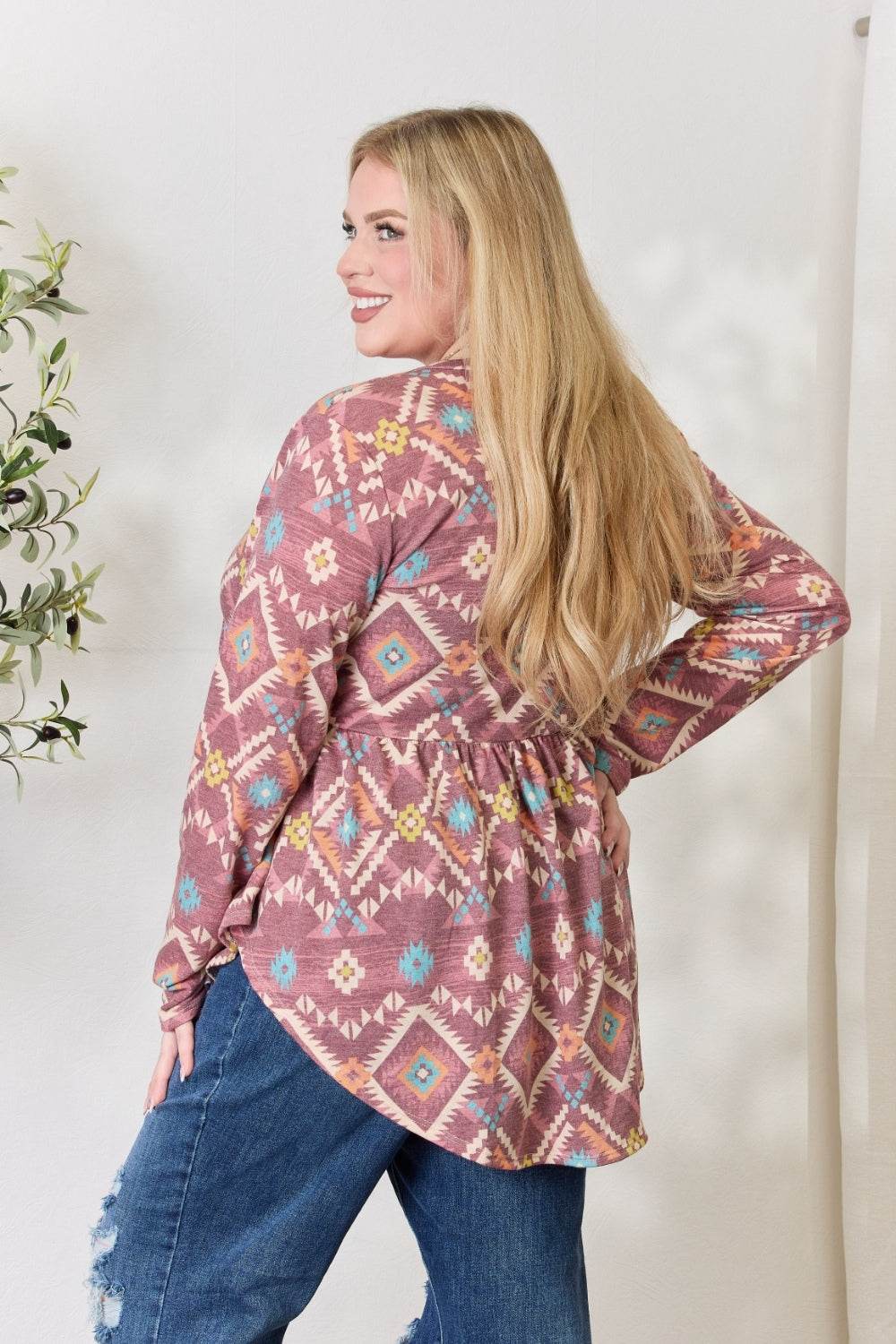 Heimish Full Size Geometric V-Neck Babydoll Top - DaTrendStore.Com