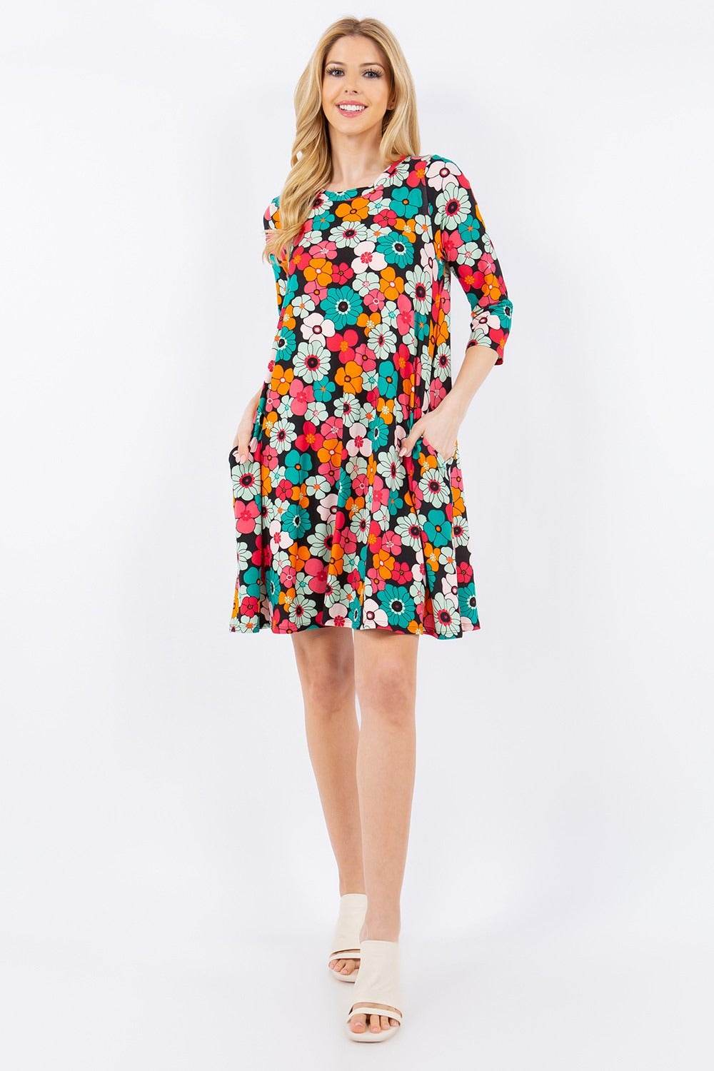 Celeste Full Size Floral Three-Quarter Sleeve Dress with Pockets - DaTrendStore.Com