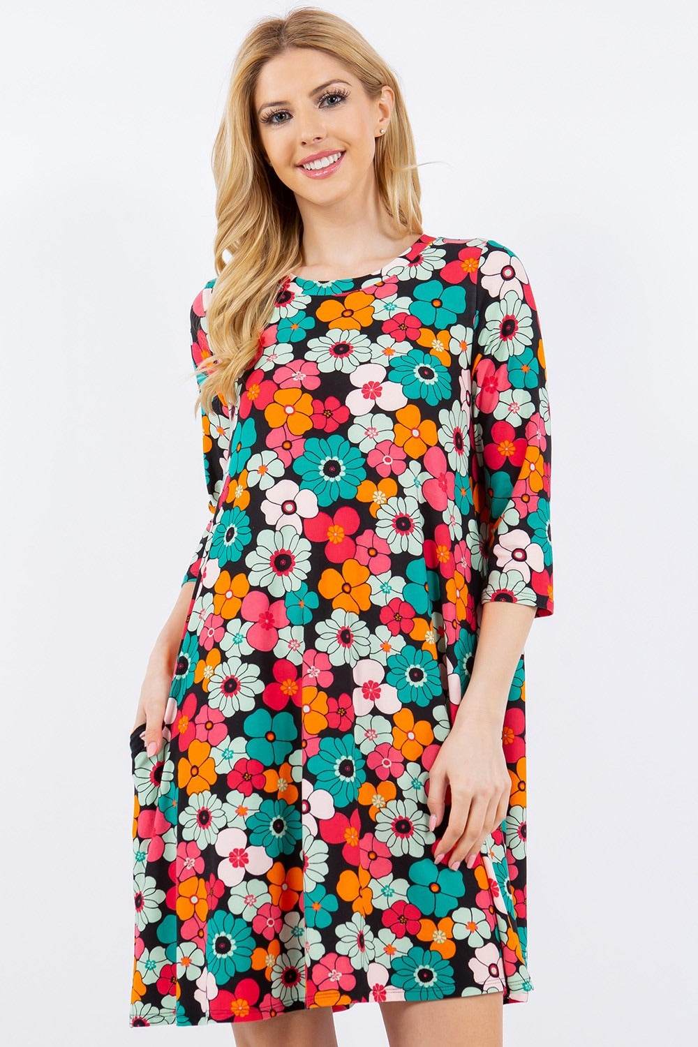 Celeste Full Size Floral Three-Quarter Sleeve Dress with Pockets - DaTrendStore.Com