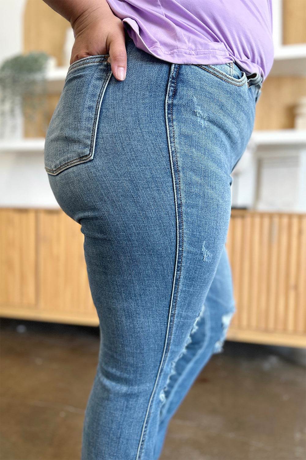 Judy Blue Full Size Distressed Raw Hem Bootcut Jeans - DaTrendStore.Com