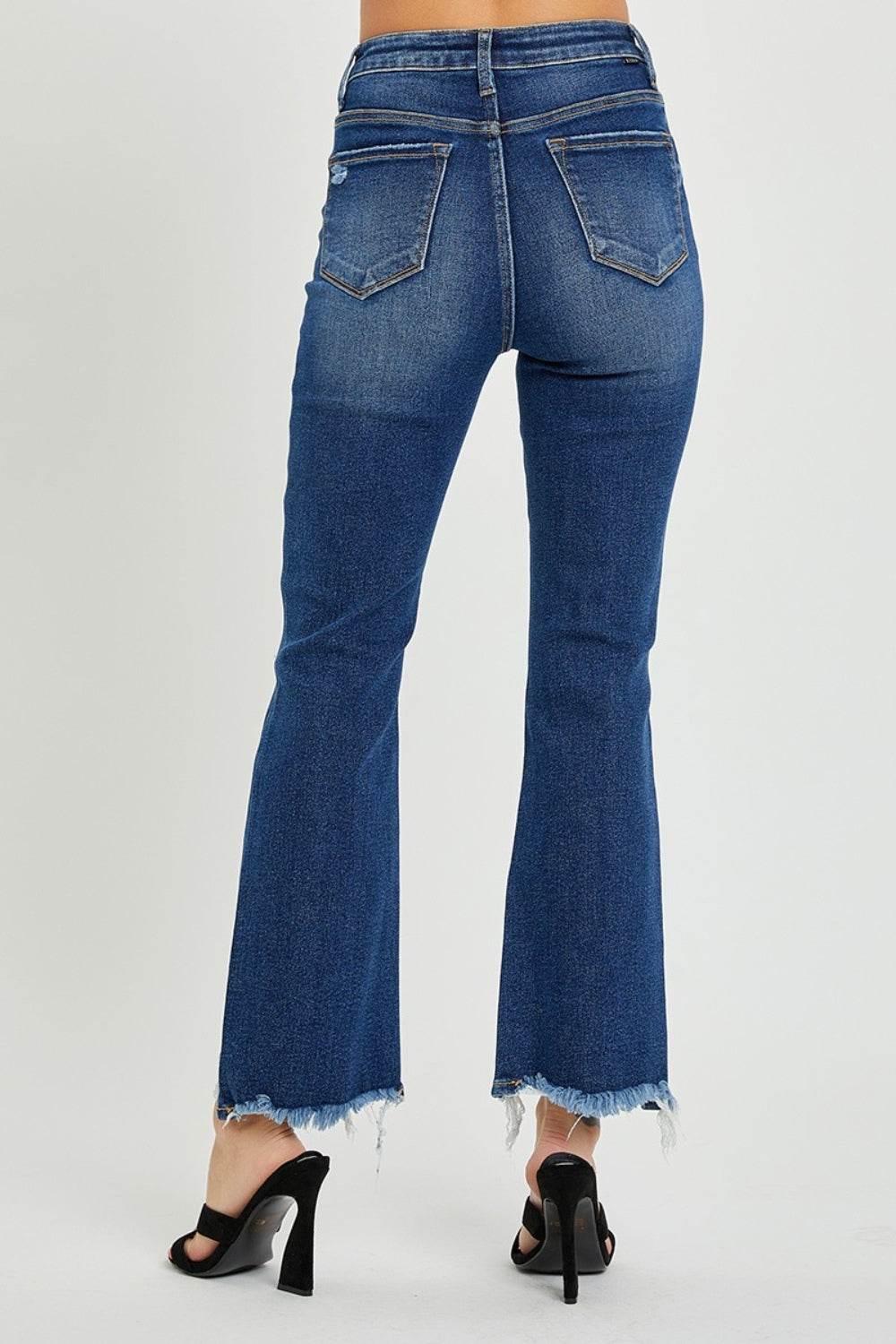 RISEN High Rise Distressed Crop Flare Jeans - DaTrendStore.Com