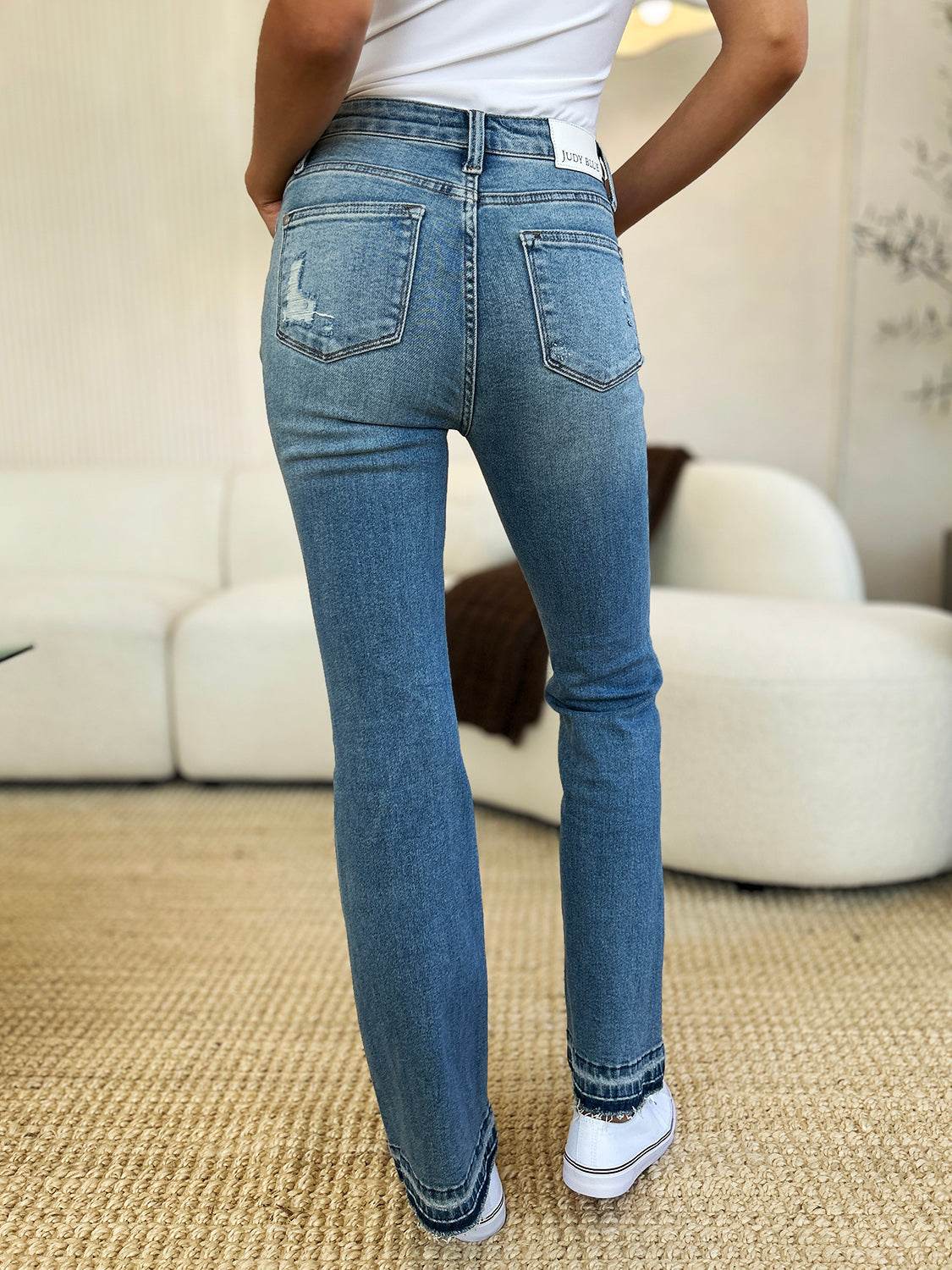 Judy Blue Full Size Mid Rise Destroyed Hem Distressed Jeans - DaTrendStore.Com