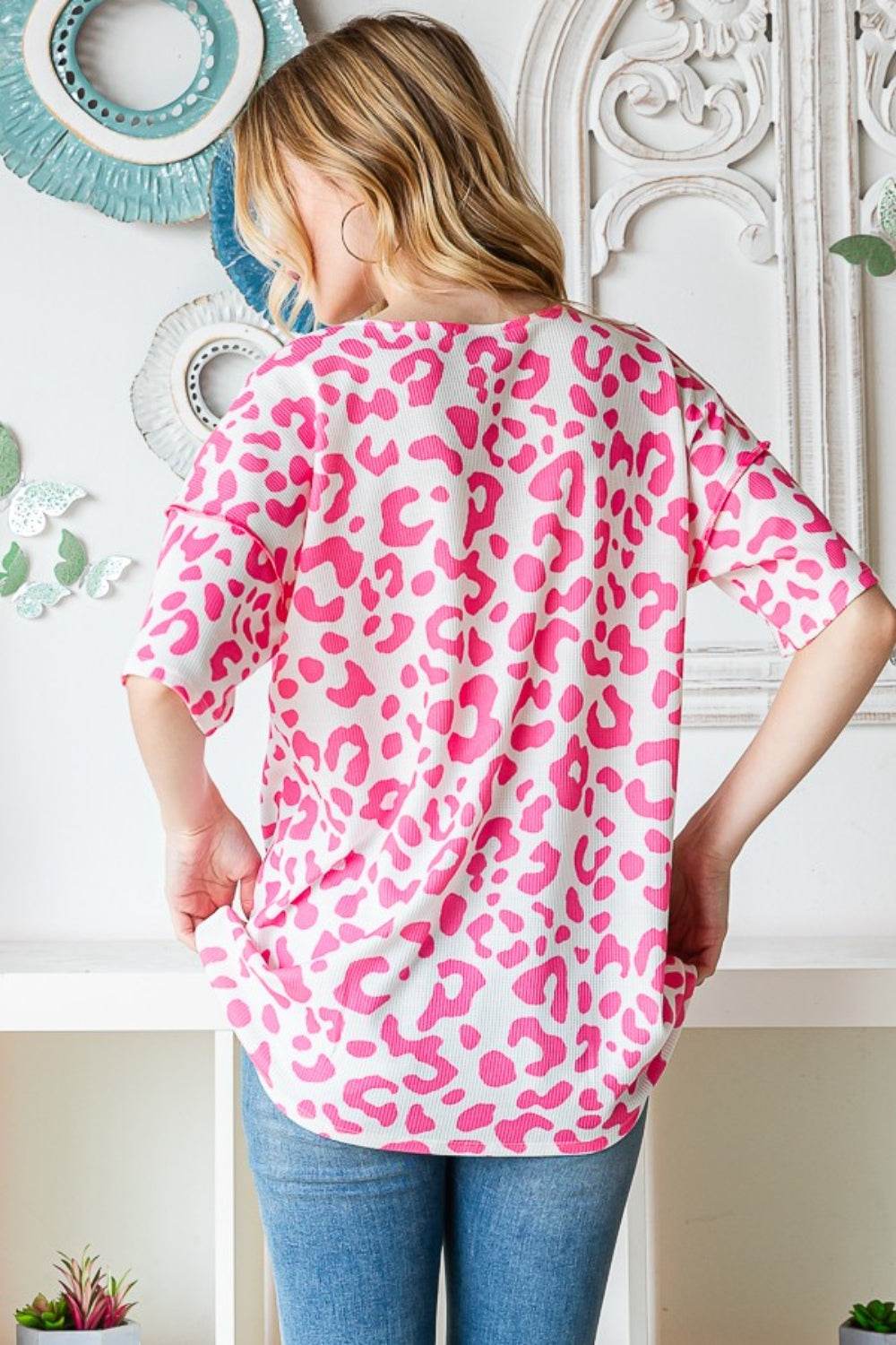 Heimish Full Size Leopard Exposed Seam Short Sleeve Top - DaTrendStore.Com