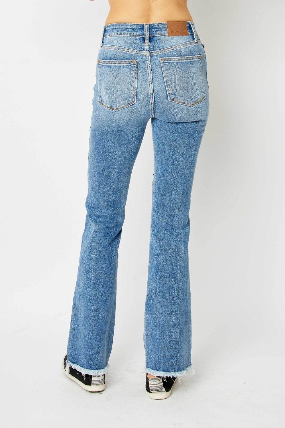Judy Blue Full Size Distressed Raw Hem Bootcut Jeans - DaTrendStore.Com