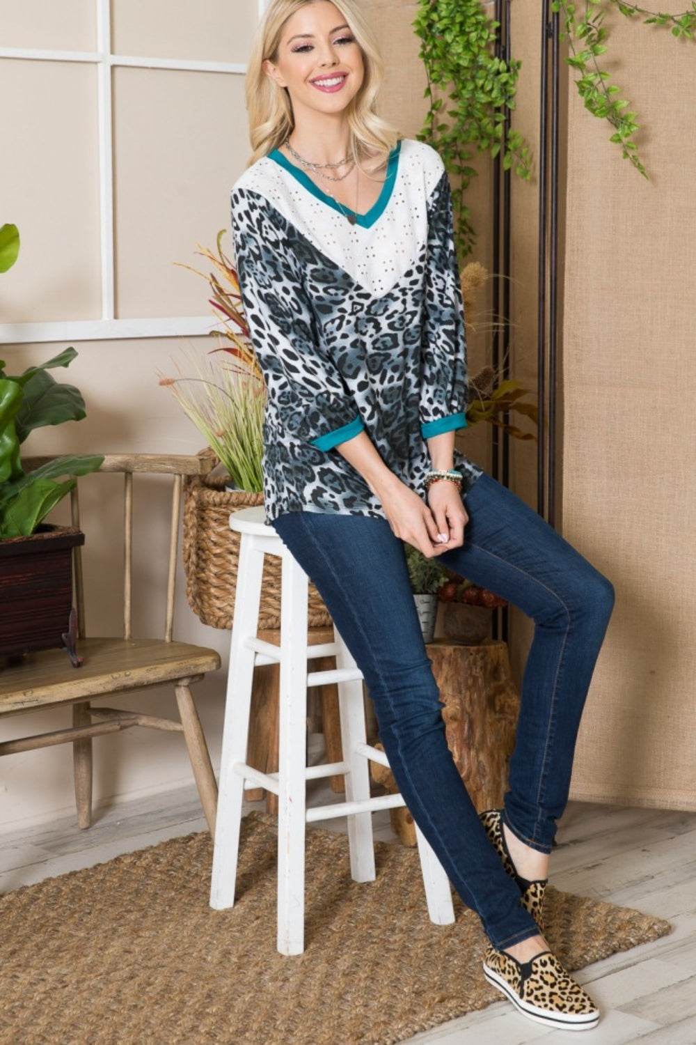 Celeste Full Size Animal Print Eyelet V-Neck Top - DaTrendStore.Com