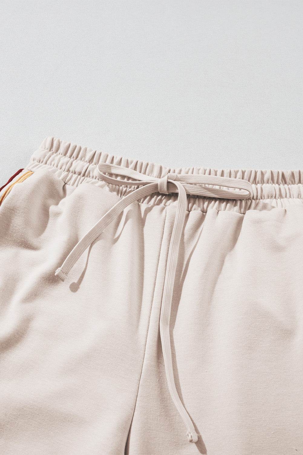 Striped Round Neck Sweatshirt and Drawstring Joggers Set - DaTrendStore.Com